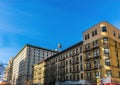 Typical apartment buildings in New York City`s borough of Manhattan on a beautiful sunny day Royalty Free Stock Photo