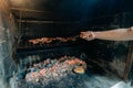 Typical Argentinian barbecue or asado. hand