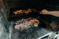 Typical Argentinian barbecue or asado. hand