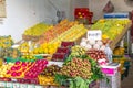 Typical Asian fruit market. Fresh tropical fruits are on the market window. Healthy, organic food