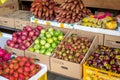 Typical Asian fruit market. Fresh tropical fruits are on the market window. Healthy, organic food