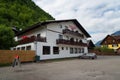 Typical Austrian Alpine house with bright flowers, Hallstatt, Austria, Europe