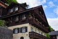 Typical Austrian Alpine house with bright flowers, Hallstatt, Austria, Europe