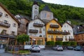 Typical Austrian Alpine houses with bright flowers, Hallstatt, Austria, Europe