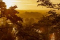 A typical autumn golden coloured sunrise seen from one of the hills outside Maastricht with a view over the valley of the river Me Royalty Free Stock Photo