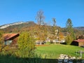 Typical autumn landscape. Hills and villages with foggy fall valley Royalty Free Stock Photo