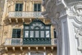 Typical balconies in the streets of Valetta, Malta Royalty Free Stock Photo