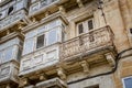 Typical balconies in the streets of Valetta, Malta Royalty Free Stock Photo