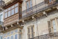 Typical balconies in the streets of Valetta, Malta Royalty Free Stock Photo