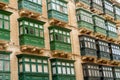 Typical balconies in the streets of Valetta, Malta Royalty Free Stock Photo