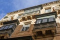 Typical balconies in the streets of Valetta, Malta Royalty Free Stock Photo