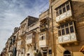 Typical balconies in the streets of Valetta, Malta Royalty Free Stock Photo