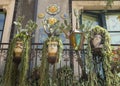 Typical balcony flower pots in form of human heads in Sicilia, Italy Royalty Free Stock Photo