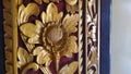A typical Balinese carving in the shape of a flower with a layer of gold called prada