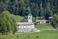 Typical alpine catholic church in Zgornje Jezersko, in Slovenia, at the border with Austria, in the julian alps mountain, Royalty Free Stock Photo