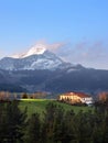 Typical basque country house surrounding by mountains