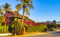 Typical beautiful colorful tourist street sidewalk city Puerto Escondido Mexico Royalty Free Stock Photo