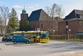 A typical Berlin bus in front of a small church at his final stop