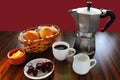 Typical brazilian breakfast table. Coffee and milk, bread and butter, fruit Royalty Free Stock Photo