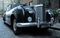 Typical brick house in Shoreditch London with Bentley vintage car Royalty Free Stock Photo