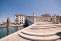 Typical bridge across a canal in Chioggia, Venice, Italy.