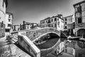 Typical bridge across a canal in Chioggia, Venice, Italy.