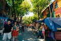 Typical brightly colored building on Caminito in La Boca witn tourists, Buenos Aires, Argentina - dec 2th 2023 Royalty Free Stock Photo