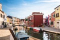 Typical brightly colored houses of Burano, Venice lagoon, Italy. Royalty Free Stock Photo