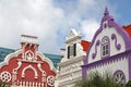 Typical brightly colours of red, green & purple painted architecture of Aruba, Curacao & Bonaire, Caribbean Royalty Free Stock Photo