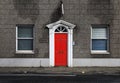 Typical British house with colorful red door in Bristol Royalty Free Stock Photo