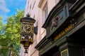 Typical british shop sign in front of a pub in London, UK