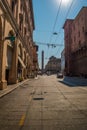 Typical building facade with Bolognese architecture on Ugo Bassi street in Bologna, Emilia-Romagna, Italy