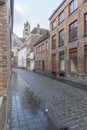 Typical buildings and cobbled street in Bruges