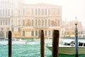 Typical bussy venetian street in misty spring day, Italy.