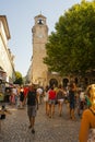 A typical busy outdoor street market in the Drome region of France on a hot summer day