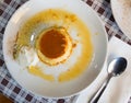 Typical catalan creme dessert flan con nata with caramel crust