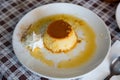 Typical catalan creme dessert flan con nata with caramel crust