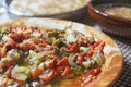 Typical Catalan escalibada dish with fresh vegetables in a rustic kitchen in Catalonia. Home made cuisine and gastronomy