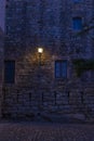 cobbled street of the town of pals in the spanish costa brava at night