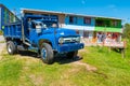 Typical Colombian blue truck and colonial houses in Guatape