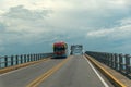 Typical bus on an iron bridge on a Colombian highway.
