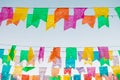 Typical colorful flags used for decoration at the June Festivals aka festas de Sao Joao, with copy space