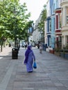 Typical Colorful Houses in Notting Hill, Lady with the Veil Dressed in Purple, London