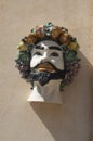 Typical pottery with human head on wall in Sicilia, Italy Royalty Free Stock Photo