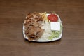 Typical combo plate of pakistani restaurants in europe with lamb Royalty Free Stock Photo