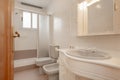 A typical conventional bathroom in a home with a shower cabin Royalty Free Stock Photo