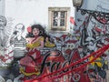 Typical Corner of Lisbon with Traditional Houses, Azulejos, Stairs, Colorful Walls and Couple of Tourists