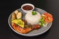 Typical Costa rican casado with rice and beans, salad, meat Royalty Free Stock Photo