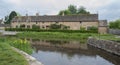 Typical Cotswold cottages on the River Eye, Lower Slaughter, Gloucestershire, Cotswolds, England, UK Royalty Free Stock Photo