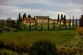 Typical country houses and cypresses in Tokana - TUSCANY, ITALY - NOVEMBER 25, 2021